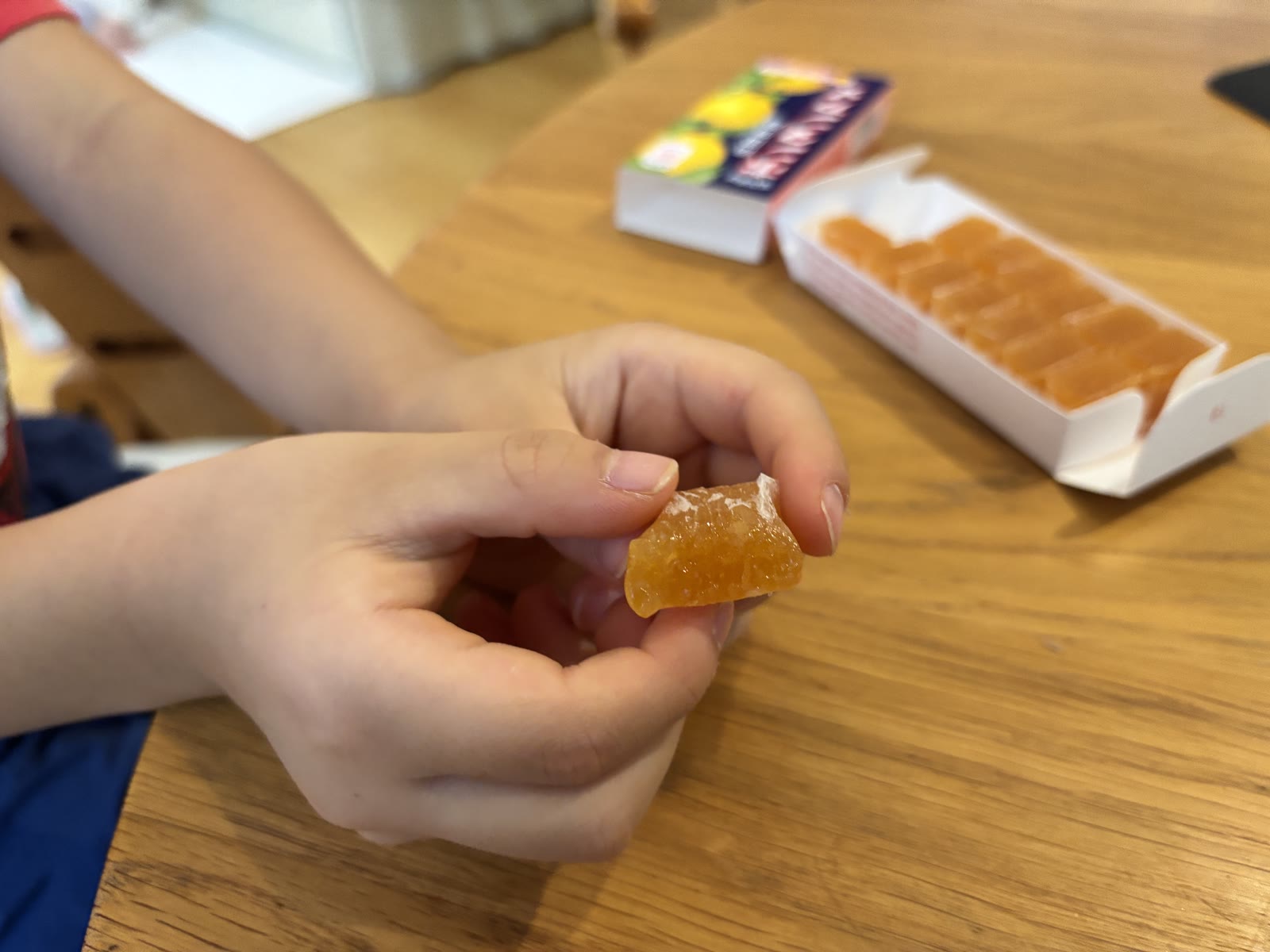 Unwrapping a piece of Botan Ame