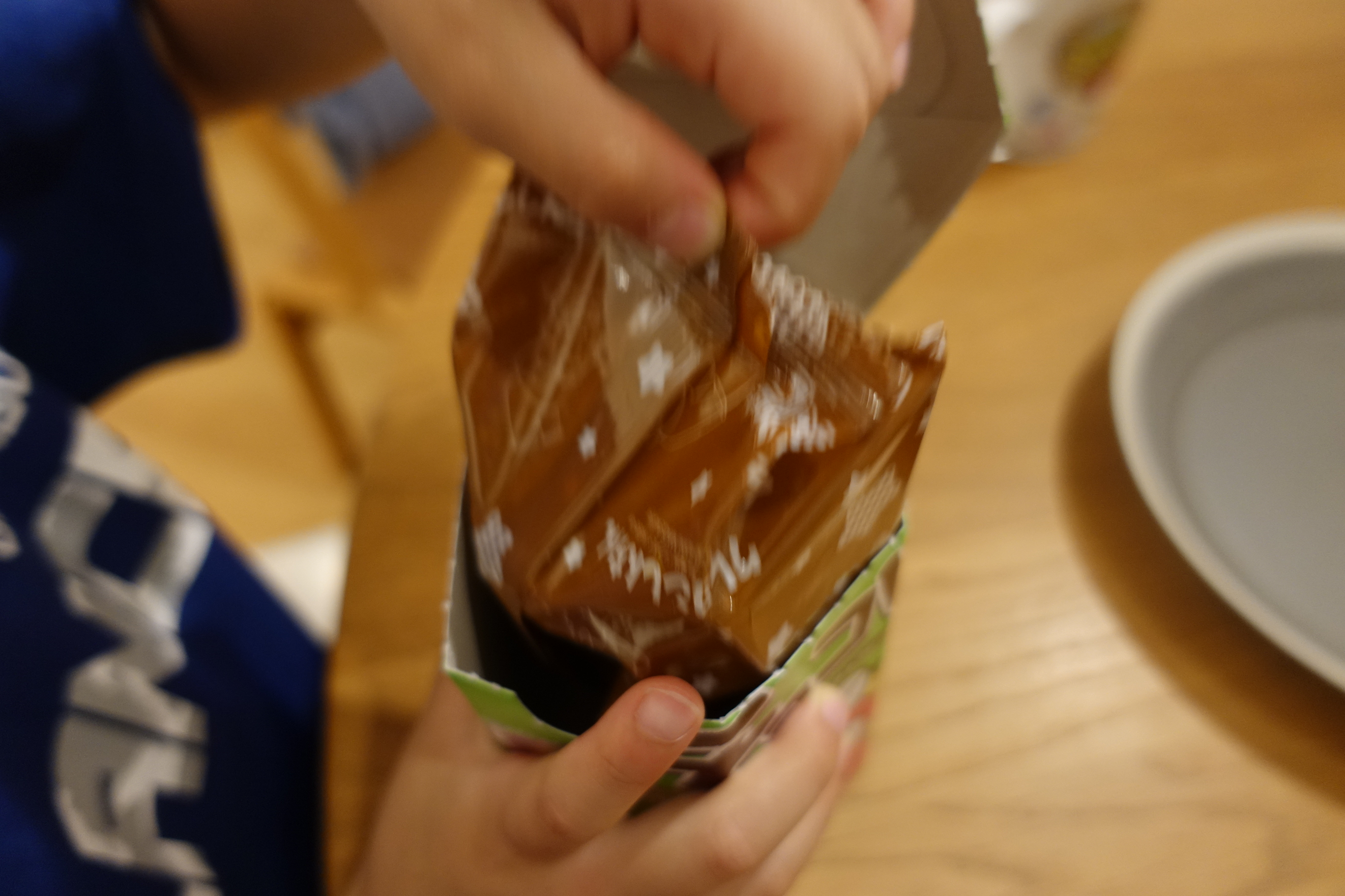 Opening an individual foil-wrapped pack
